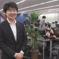 One among few: Taichi Murakami, president of Livesense, poses at the company\'s head office in Shibuya Ward, Tokyo, on Dec. 13. | SATOKO KAWASAKI