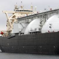 &#165;1 trillion guarantee: A liquefied natural gas tanker operated by Energy Advance Co., a unit of Tokyo Gas, lies moored at the company\'s plant in Sodegaura, Chiba Prefecture, last March. | BLOOMBERG