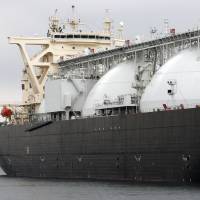 ¥1 trillion guarantee: A liquefied natural gas tanker operated by Energy Advance Co., a unit of Tokyo Gas, lies moored at the company’s plant in Sodegaura, Chiba Prefecture, last March. ¥1 trillion loan guarantee set for LNG quest
