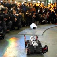 Hold it, there\'s more: The Sakura robot, equipped with camera and thermal imager, is put through its paces in front of the media Wednesday in Narashino, Chiba Prefecture. | YOSHIAKI MIURA