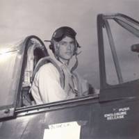 Ensign Lee Olson mans his Hellcat aboard the carrier USS Essex in late 1944 in the Pacific. | PHOTO COURTESY OF LEE OLSON