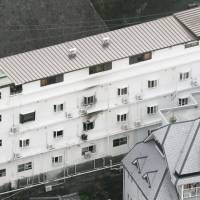 Fatal fire: The Bell House Higashiyamato nursing facility is seen Saturday in Nagasaki after a fire broke out the night before, killing four of its elderly residents and leaving two more unconscious. | KYODO