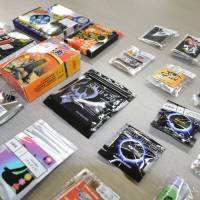 Variety pack: Quasi-legal drugs sold by Internet-based vendors are arranged for a photo in May 2011. | KYODO