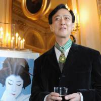 Prestige: Kabuki actor Bando Tamasaburo poses after receiving the Commander of the Order of Arts and Letters award, one of France\'s highest cultural medals, on Tuesday in Paris. | KYODO