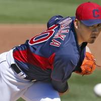 First taste: Daisuke Matsuzaka pitches in his first spring training appearance for the Cleveland Indians against the Cincinnati Reds on Sunday. | KYODO