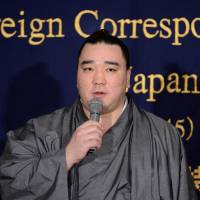 Keep your head up: Yokozuna Harumafuji speaks during an event at the Foreign Correspondents\' Club of Japan earlier this week. | AFP-JIJI