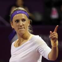 One for the road: Outgoing world No. 1 Victoria Azarenka gestures during the Qatar Total Open final on Sunday. Azarenka defeated her successor at No. 1, Serena Williams, 7-6 (8-6), 2-6. 6-3. | AP