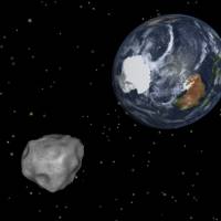Flying visit:  This image provided by NASA/JPL-Caltech shows a simulation of asteroid 2012 DA14 approaching from the south as it passes through the Earth-moon system on Feb. 15. | AP
