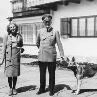 The banality of evil: Eva Braun and Adolf Hitler pose with their dogs in Berchtesgaden. Braun\'s home movies, uncovered by artist Lutz Becker in the 1970s, offer a remarkably unmediated view of Hitler and of the Nazi high command. | BUNDESARCHIV