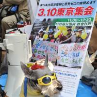 Long goodbye: Antinuclear protesters rally outside the Diet building Sunday in Tokyo, on the eve of the second anniversary of the March 11, 2011, quake and tsunami that triggered one of the worst nuclear catastrophes the world has seen.
 | YOSHIAKI MIURA