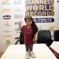 Not a doll: Jyoti Amge, 19,  who comes from Nagpur in India, is the world\'s shortest woman at 58.4 cm tall, the Guinness Book of Records says. She is seen in Kuwait City on Thursday. | AFP-JIJI