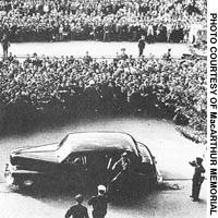 Gen. Douglas MacArthur, with an aide to his left, is greeted by crowds as he leaves the General Headquarters in Tokyo on Nov. 3, 1946, the day of the promulgation of the new Constitution by Emperor Hirohito. They came, they saw, they democratized