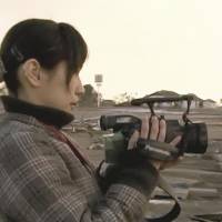 Breaking the silence: Ayako Imamura shoots footage for her latest documentary film, \"3.11 Without Sound,\" at Sendai Airport. | &#169; STUDIO AYA