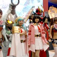 Into the spirit: Tokyo International Anime Fair attendees dress up as their favorite characters from anime. | YOSHIAKI MIURA