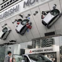 Electric buzz: Mitsubishi Motors Corp.\'s i-MiEV electric vehicle is displayed at its unveiling at the automaker\'s Tokyo headquarters on June 5. | SATOKO KAWASAKI PHOTO