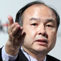 Sun worshipper: Softbank Corp. President Masayoshi Son holds a news conference in Tokyo on May 30. | BLOOMBERG