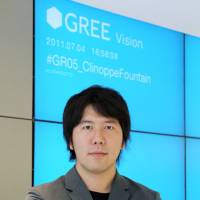 Seeking a level playing field: Yoshikazu Tanaka of Gree Inc. poses at the company\'s headquarters in Tokyo in July. | BLOOMBERG