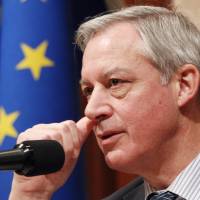 Euro update: Bank of France Gov. Christian Noyer holds a press conference Monday in Tokyo. | AP PHOTO