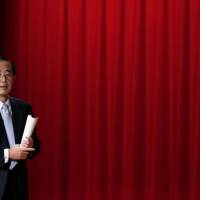 Let\'s talk financing: Bank of Japan Gov. Masaaki Shirakawa pauses during an address Monday at the Europlace International Financial Forum in Tokyo. | BLOOMBERG