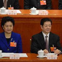 New to prime time: New Vice Premier Liu Yandong, Wang Zhaoguo, chairman of the All-China Federation of Trade Unions, and new Vice Premier Ma Kai appear at the NPC\'s closing session. | AFP-JIJI