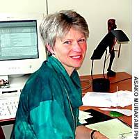 Marion S. Kappeyne van de Coppello works at the desk she shares along with her job. | JT: YOSHIAKI MIURA