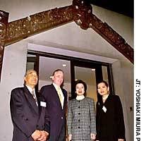 The New Zealand Embassy  in Tokyo debuts a traditional Maori entryway Wednesday in a ceremony marking 50 years of bilateral relations attended by (from left) Paratene Te Huia, New Zealand Ambassador Phillip Gibson, Justice Minister Mayumi Moriyama and Chansuda Gibson. | BLOOMBERG