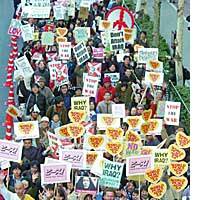 Antiwar protesters make their feelings known near JR Shinbashi Station in Tokyo on Saturday afternoon. | PHOTO COURTESY OF MASAYA TAKAHASHI