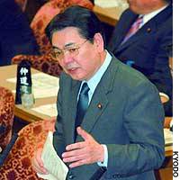 Japanese Communist Party lawmaker Hideyo Fudesaka, seen here asking a question in a Lower House Budget Committee session in March, has resigned. | PHOTO COURTESY OF OMIYA LAW SCHOOL