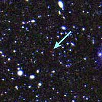 The arrow points to the farthest galaxy from Earth found to date, some 12.9 billion light-years away. The image was captured by Japan\'s Subaru telescope on Hawaii Island. | PHOTO COURTESY OF THE NATIONAL ASTRONOMICAL OBSERVATORY OF JAPAN