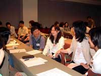 Japanese and South Korean teachers of English discuss the differences and similarities of their countries at a workshop in Seoul last August. Teachers develop trilingual textbook