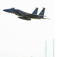 An F-15 fighter jet takes off from Kadena Air Base in Okinawa. | PHOTO COURTESY OF TAKAYUKI SUZUKI