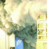 Firefighters work to extinguish a blaze that broke out Sunday morning at the Kadokawa-Daiei movie studio in Chofu, western Tokyo. | PHOTO COURTESY OF TAKAYUKI SUZUKI