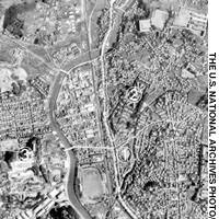 Aerial photographs taken by the U.S. military show the city of Nagasaki two days before the Aug. 9, 1945, atomic bombing and one day after the bombing. | JAPAN AIRLINES PHOTO/KYODO