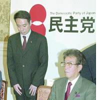 Democratic Party of Japan leader Seiji Maehara (left) and the DPJ\'s newly appointed Diet affairs chief, Kozo Watanabe, attend a gathering of the opposition party\'s Diet members at the Diet on March 3. | NOBUKO TANAKA