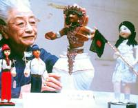 Tenkoko Sonoda looks at some of the “peace ambassador dolls” sent by 57 countries. Pioneer for women seeks home for peace dolls