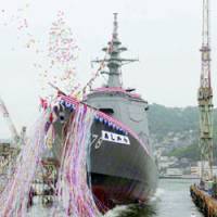The Aegis Destroyer Ashigara is launched in a Nagasaki shipyard Wednesday. | KYODO PHOTO