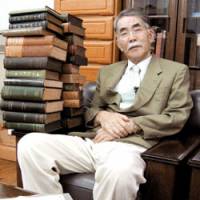 Shigeru Hiyama, a collector of items related to writer Lafcadio Hearn, poses during an interview in Osaka in July. | KYODO PHOTO