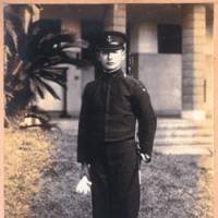 Masamichi Shida in February 1944, at age 18, posing at the elite naval academy at Edajima, off the coast of Hiroshima Prefecture and near the site of the first atomic bombing. Seen here with a prestigious \"tanken\" (short sword) at his side, he would soon become a kamikaze pilot. | PHOTO COURTESY OF MASAMICHI SHIDA