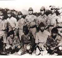 Lee Hak Rae (left) poses with other Korean civilian workers recruited by the Imperial Japanese Army to guard POWs forced to build the Thai-Burma railway in Thailand in 1942. Spared Korean war criminal pursues redress