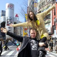 Cameron and Miki Scholes pose for a photo in Tokyo\'s Shibuya Ward on March 8. | YOSHIAKI MIURA PHOTO