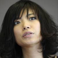 Writer Mieko Kawakami answers questions during an interview in Tokyo on March 5. | AP PHOTO