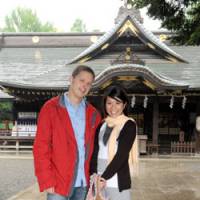Drawn together: Polish-native Jacek Strakowski and Mai Usami pose at Okunitama Jinja Shrine in Fuchu, Tokyo, on May 10. Shared goals, IT connect Polish-Japanese couple