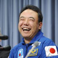 Psyched: Astronaut Satoshi Furukawa holds a news conference in Tokyo on Monday about his six-month mission set to begin in spring 2011. | KYODO PHOTO