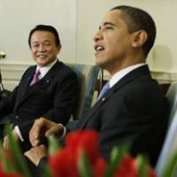 A brief and shining moment: Prime Minister Taro Aso meets with President Barack Obama in the Oval Office on Tuesday. | AP PHOTO