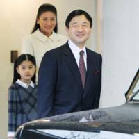 Water won\'t wait: Prince Naruhito gets into a car at his official residence in Tokyo\'s Motoakasaka district Saturday to leave for Turkey, as Princess Masako and daughter Aiko look on. | POOL PHOTO