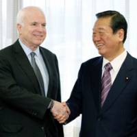 Welcome: Democratic Party of Japan leader Ichiro Ozawa greets visiting U.S. Sen. John McCain at DPJ headquarters Friday in Tokyo. | KYODO PHOTO