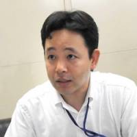 Foreign affairs: Kazuyuki Motohari of the Immigration Bureau\'s General Affairs Division speaks with The Japan Times at the bureau in Chiyoda Ward, Tokyo, on Tuesday. | SATOKO KAWASAKI PHOTO