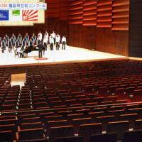 Audience of none: A high school choir sings to an empty hall at a competition that began Friday at Alios Iwaki Performing Arts Center in Fukushima Prefecture. Audiences were not permitted, in order to prevent the spread of the H1N1 flu. | KYODO PHOTO