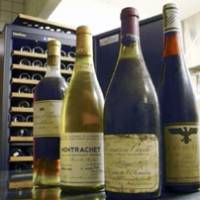 Auctioned off: Bottles of rare vintage wines owned by the Osaka Municipal Government, including Romanee-Conti 1921 (second from right), will be auctioned next month after the city\'s wine museum closed. | KYODO PHOTO