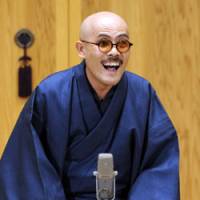 Slap shtick: Fukuten Katsura, a blind performer of \"rakugo\" traditional comic storytelling, performs on stage for the first time Monday evening in Osaka. | KYODO PHOTO